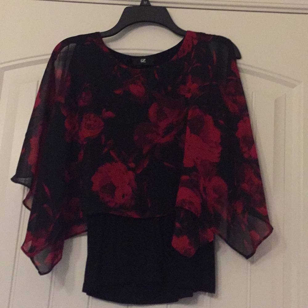 Blouse with black tank top underneath